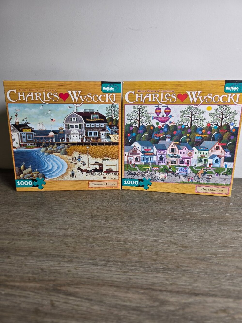 Set of Two (2) Charles Wysocki 1000 Piece Jigsaw Puzzles by Buffalo Games